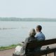 estate planning, image of couple sitting in a bench looking at body of water