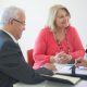 Avoid Estate Taxes, image of couple in an office meeting