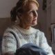 avoid probate, image of senior woman pensively gazing while seated indoors