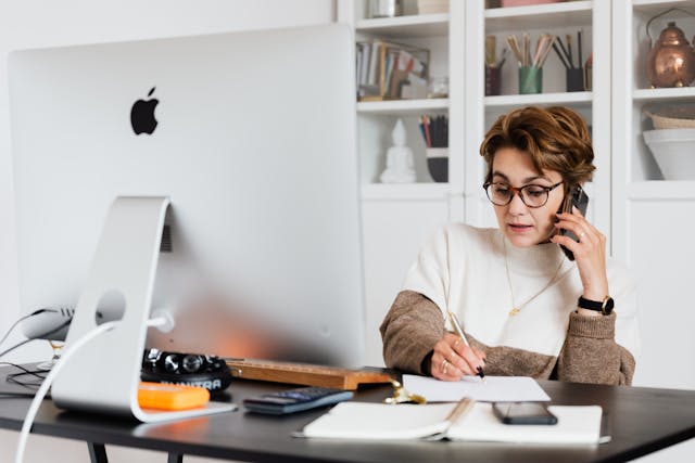 executor or trustee, image of woman multitasking in an office