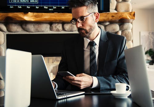 what is a testamentary trust, image of man in a suit working in an office