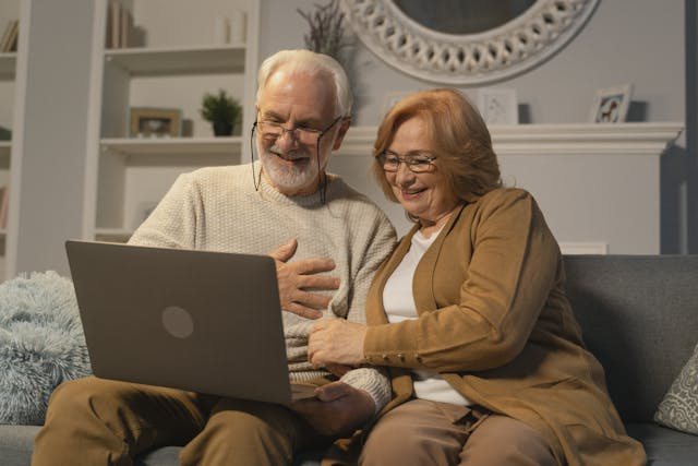 What Are Contingent Beneficiaries and Why Do I Need Them, image of senior couple looking at a laptop together