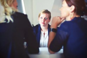 estate planning, image of businesswoman at a meeting